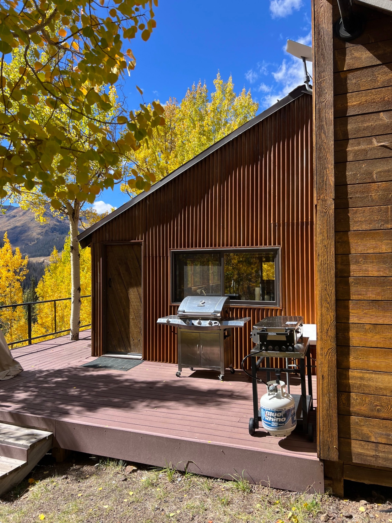 Hoosier cabin deck in autumn aspens